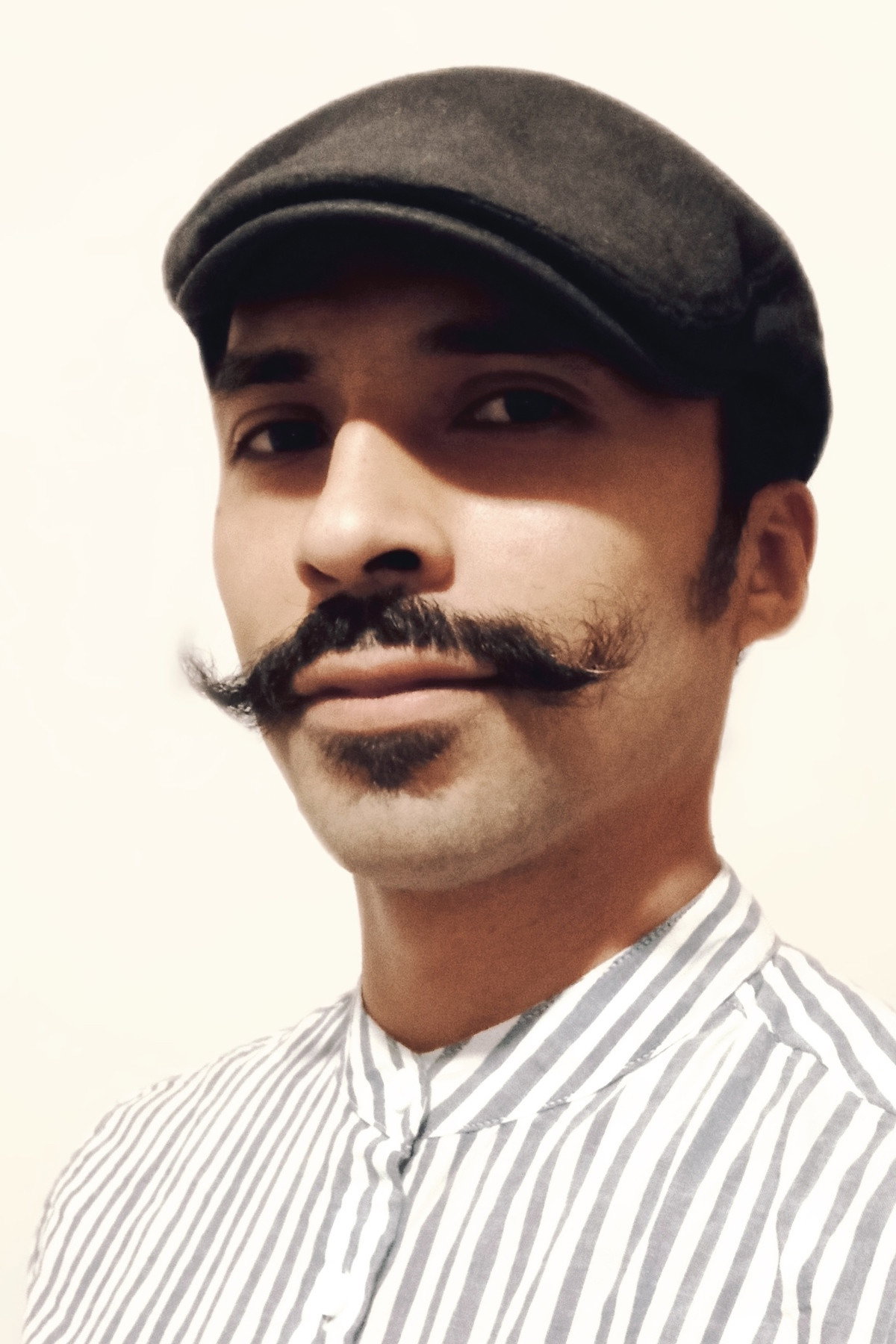 César Julio Ortega as H in About the Beginning