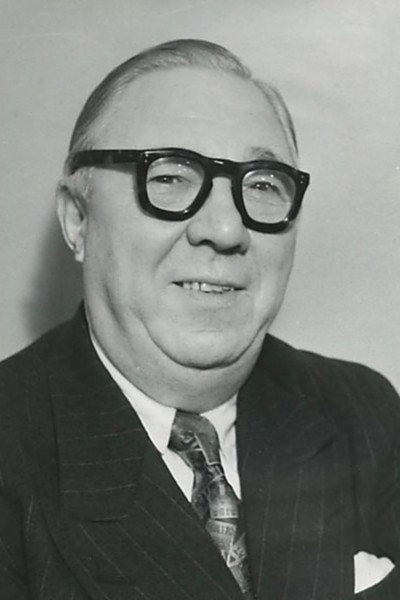 Henry Nielsen as Valdemar Engblomme, natportier in Sikken en nat