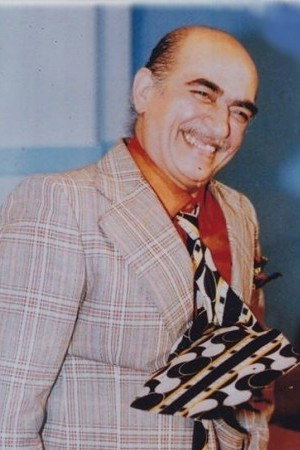 Hassan Raziani as Eynollah Begherzadeh in Samad and Sami, Leyla and Lili
