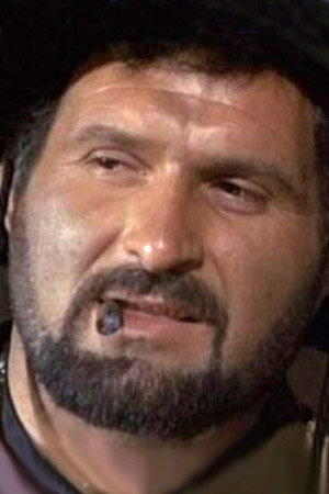 Emilio Messina as Chink / Cinc - Bookmaker in The Boxer