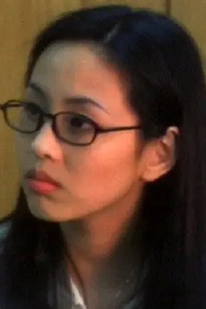 Michelle Wong Man as Mimi Chan in Hu-Du-Men