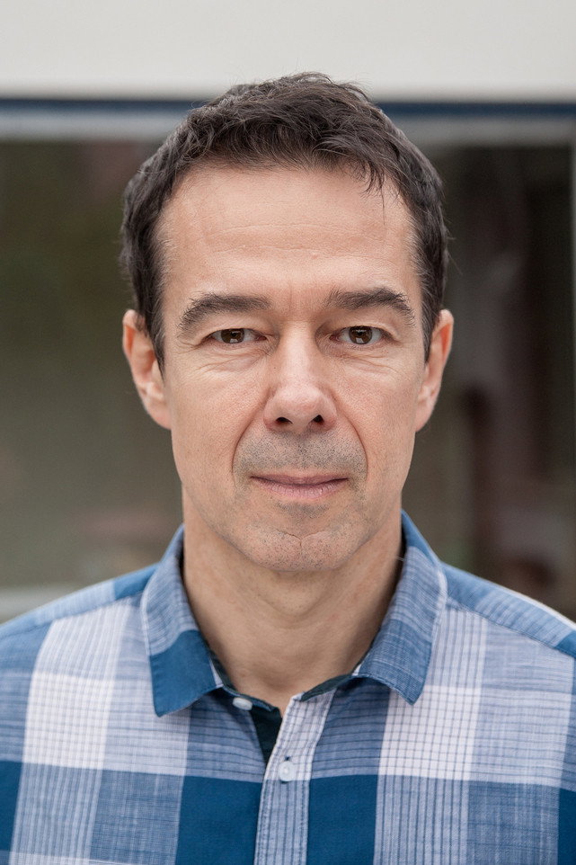 Janusz Onufrowicz as Piotr Szymański in Damned America
