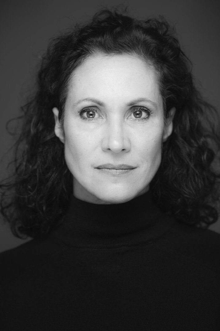 Justine del Corte as Mrs. Brecht in Second Hand Child