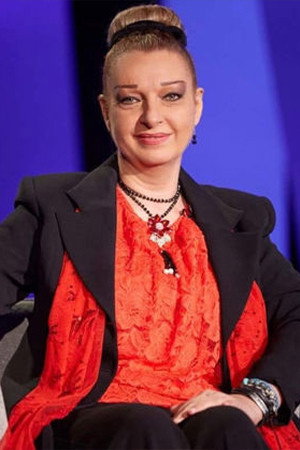 نادين خوري as ام علاء in Born into Wealth