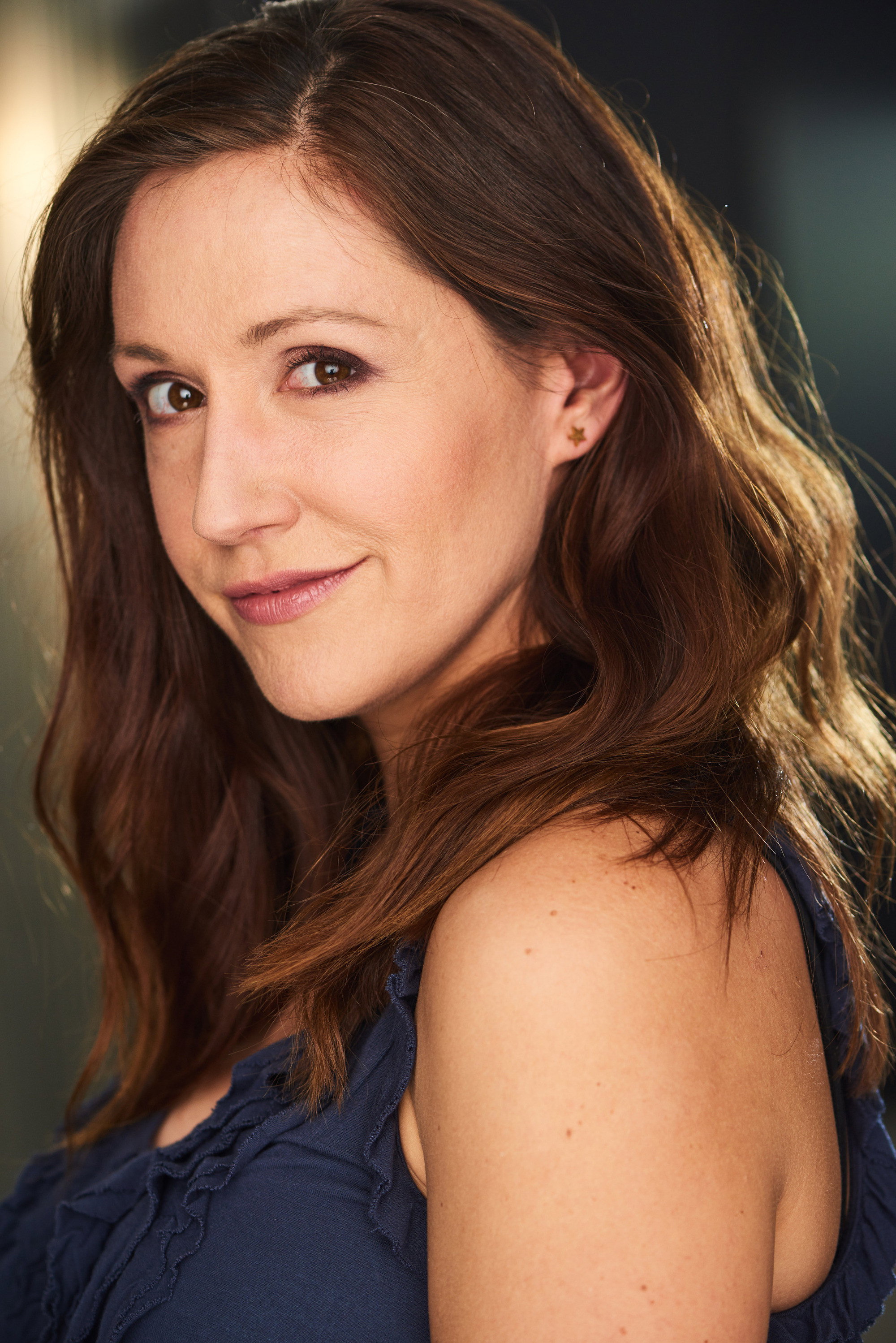 Kelly Vrooman as Real Estate Broker: Don't Look Into Their Eyes in The Source of Shadows