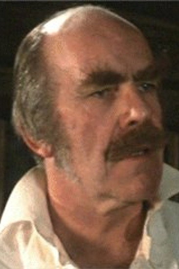George Belbin as Burgess in Man of Violence