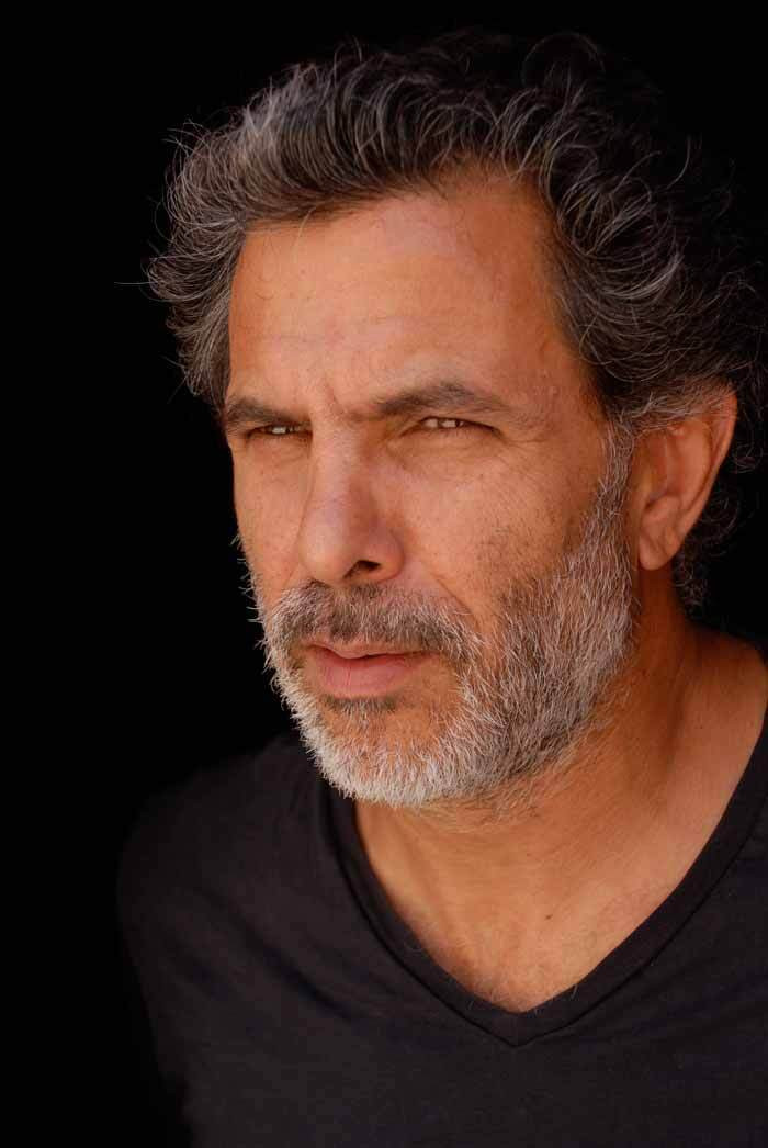 Juliano Mer-Khamis as Thomas in Bar 51