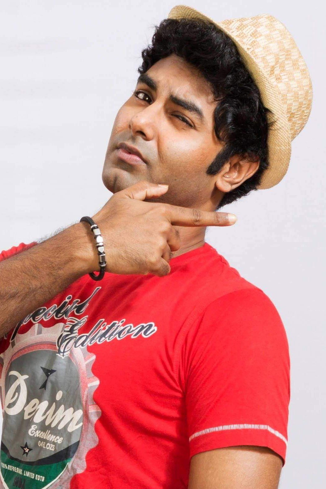 Arna Mukhopadhay as BrajaDulal Ghosh in Byomkesh Hotyamancha