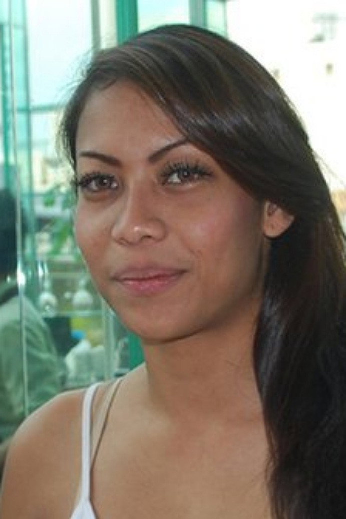 Nazira C. Noer as Dina in The Red Point of Marriage