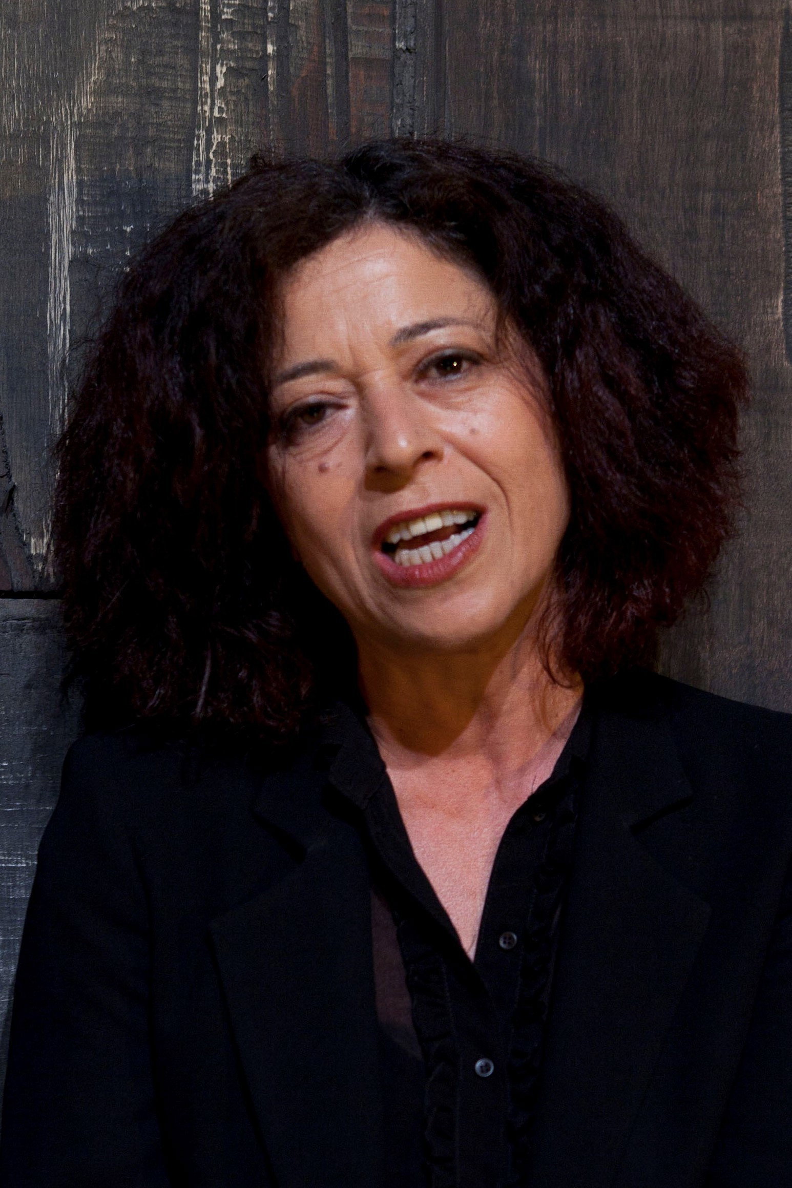 Salwa Nakkara as Najwa (Mouna's mother) in Mouna