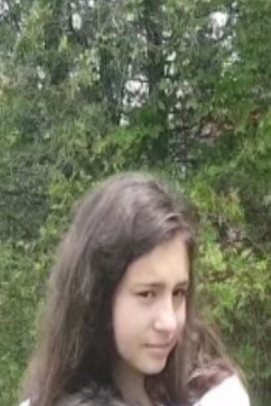 Emily Cabral as Emily in The Devil's Forest