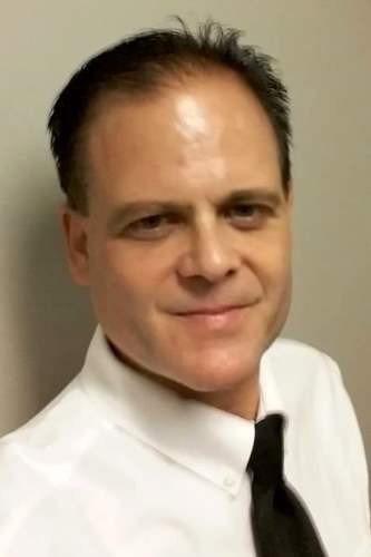 Jon Arthur as Police Chief in Johnny Frank Garrett's Last Word