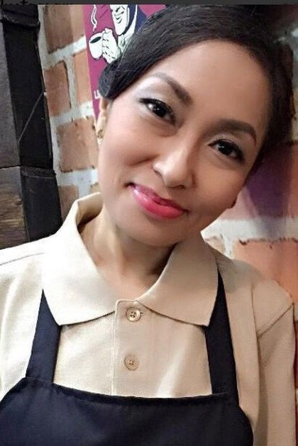 Niniek Arum as Titiek in Olivia