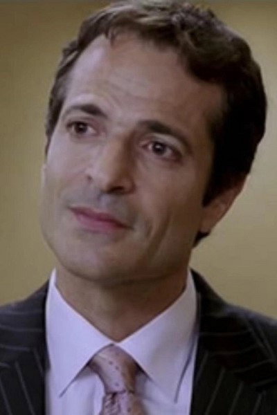 Stewart Bick as Mitchell Thomson in False Pretenses