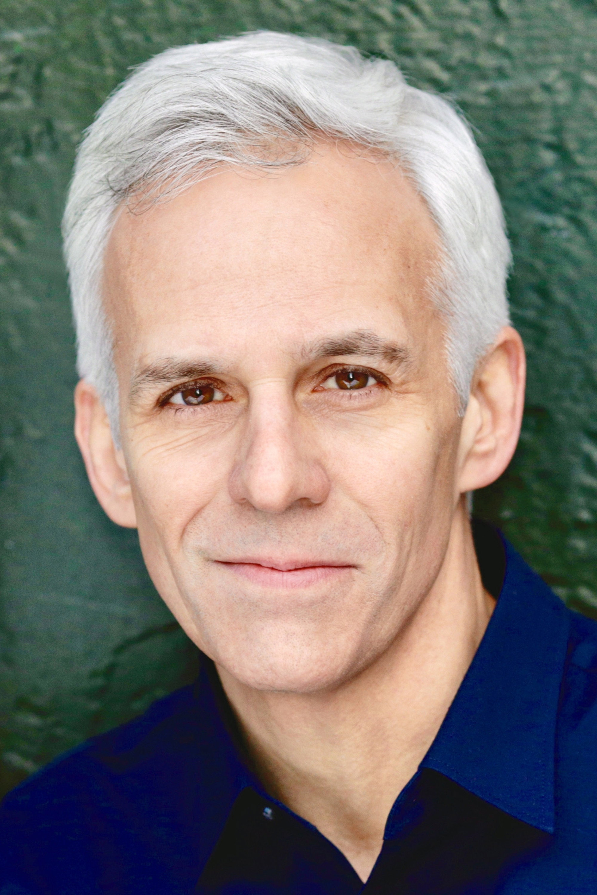 Neal Mayer as The Auctioneer in A Wounded Fawn