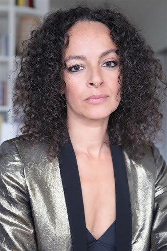 Alika Del Sol as Caro in The Mother and The Assassin