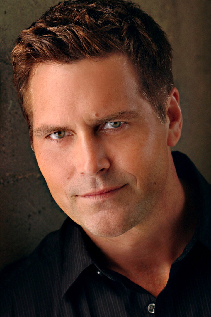 Eric Scott Woods as John Stone in Sand Sharks