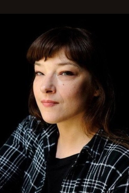 Catherine Grosjean as Adèle in Nuclear Family