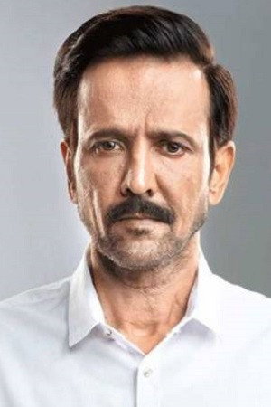 Kay Kay Menon as Indrashish Shah in Ray