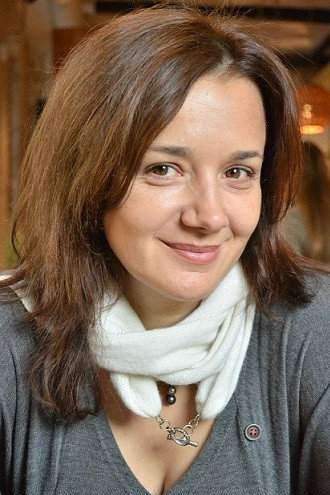 Даниэла Стоянович as Olga in The O.K.O. Agency