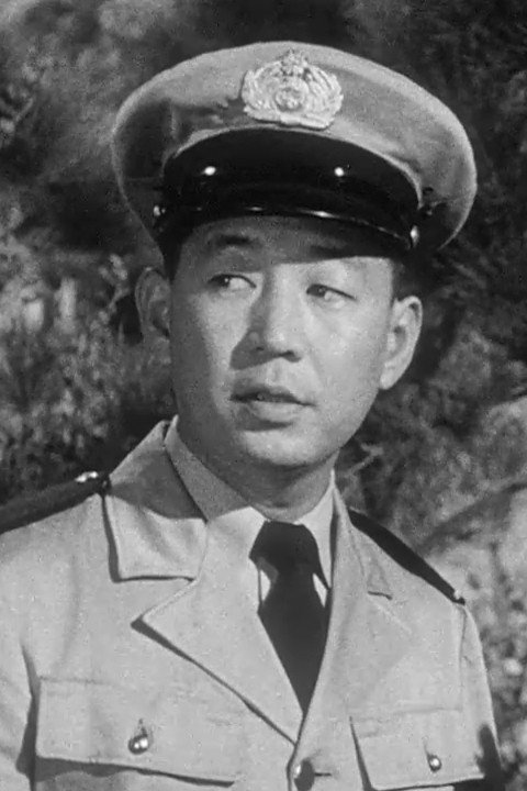 Frank Iwanaga as Security Officer Tomo Iwanaga (as Frank Iwaiga) in Godzilla, the Monster of the Pacific Ocean