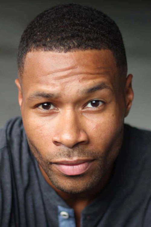 Karon Riley as Malcom Britton in The Black Hamptons