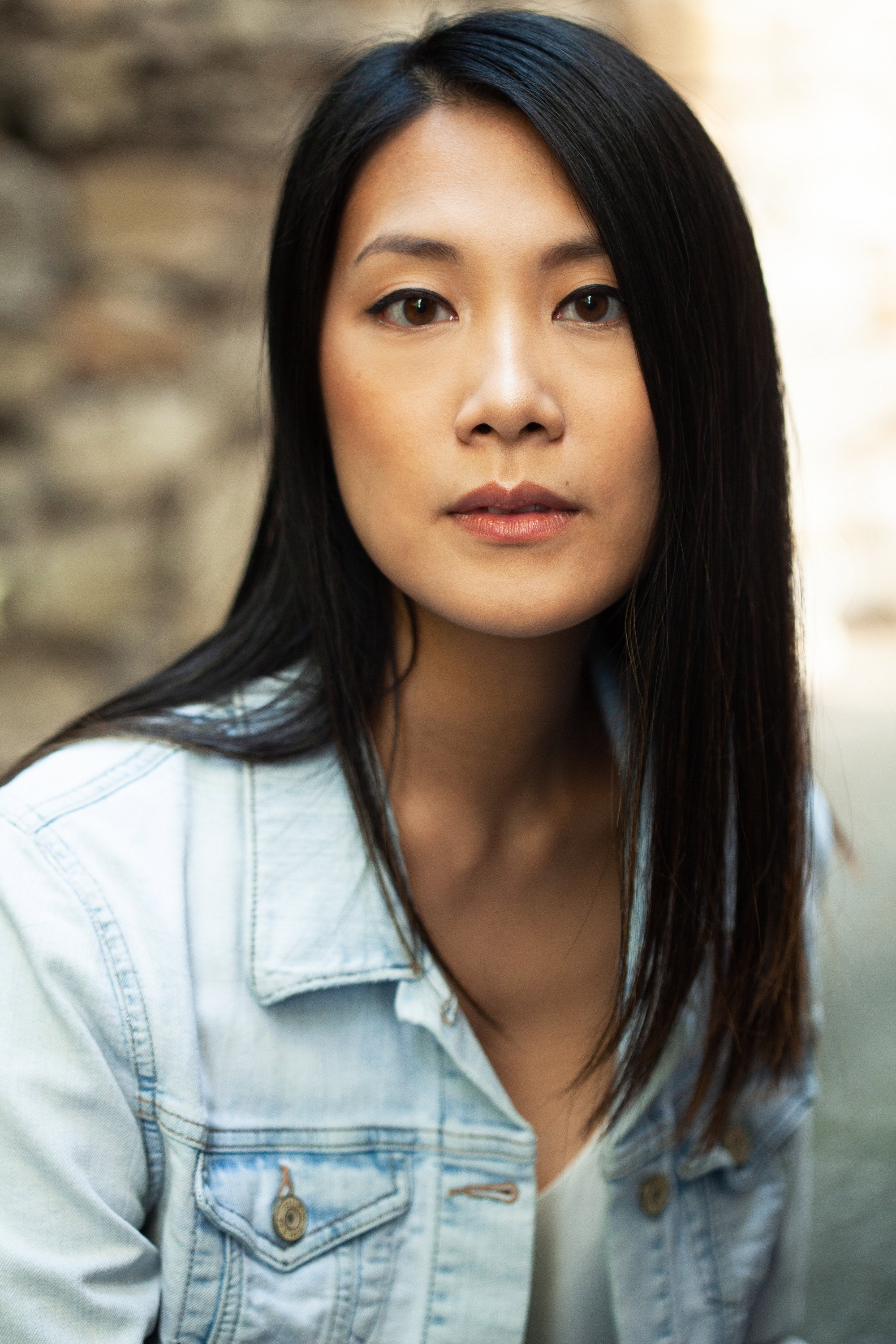 Amanda Ip as Dominique in A Christmas Serenade