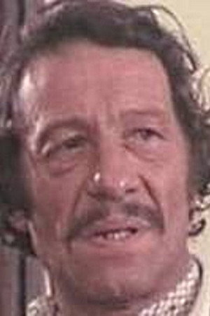 André Lacombe as The Dog Hunter in L'Ours