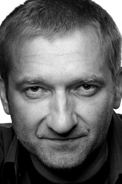 Adam Hutyra as Juliś in Darmozjad polski