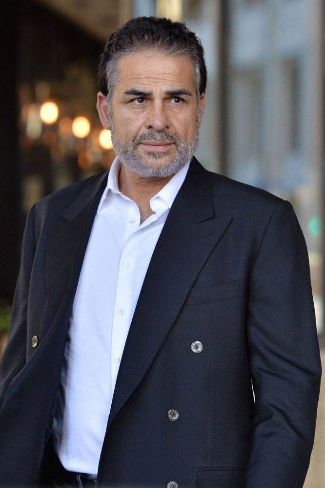 Houshang Touzie as Kazem in Checkpoint