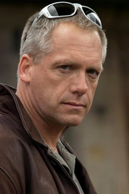 Paul Radki as Officer Theo in Henry Needs A Cat