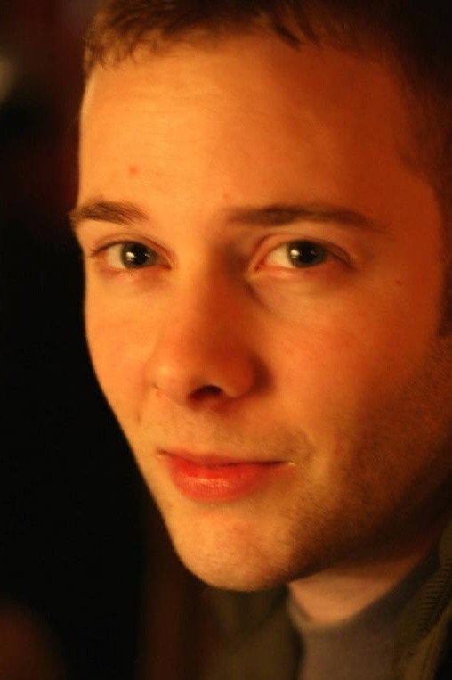 Aidan David as Rick in Spin