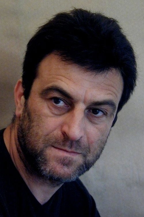 Ljupčo Todorovski as Komita in The Premiere
