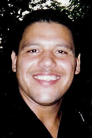 Tony Gomez as Father Townsend in Forsaken