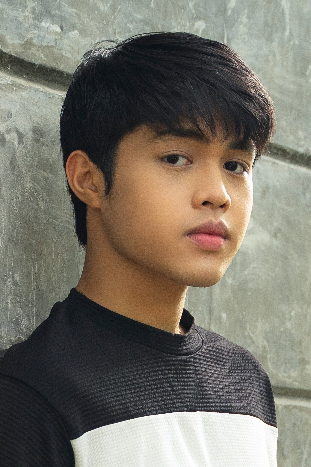Elijah Canlas as Jun in The Woman and the Gun