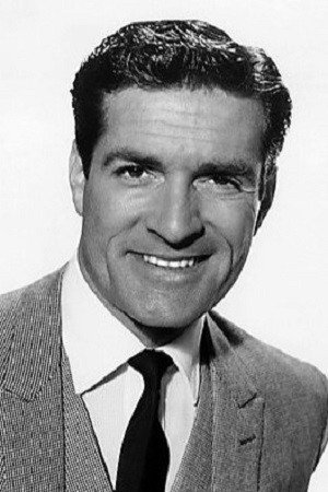 Hugh O'Brian as Hank Walker in Love Has Many Faces