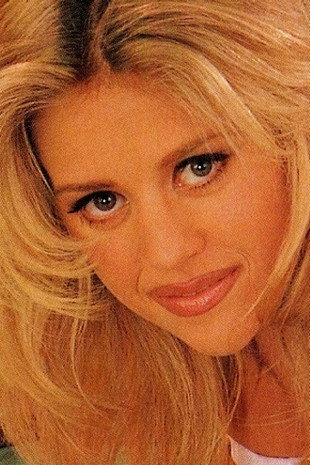 April Adams as Brigitte in Babewatch 4