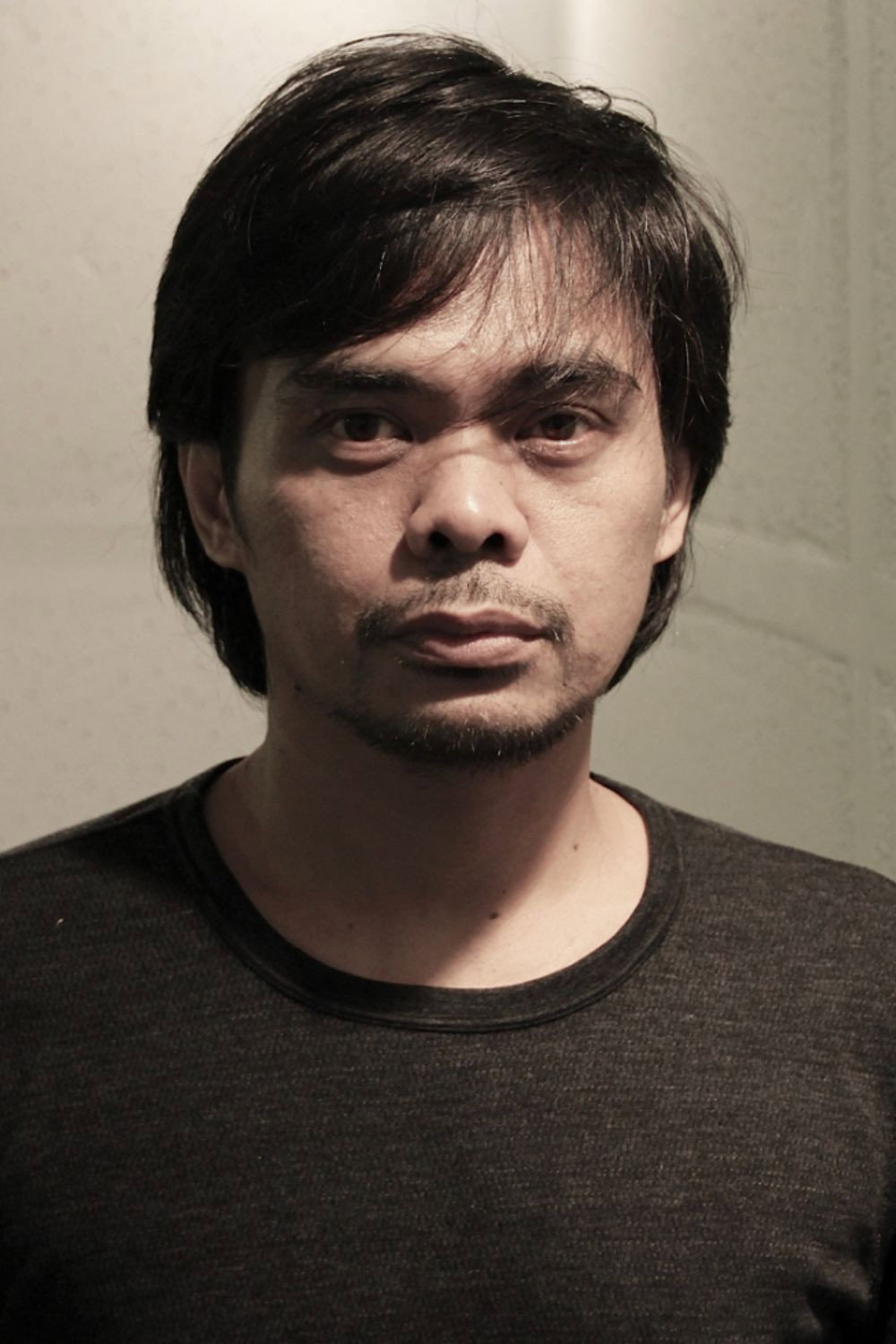 Yudi Ahmad Tajudin as Iwan Angsa in Vengeance Is Mine, All Others Pay Cash