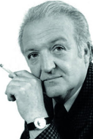 Bernard Freyd as Doumene in Love in the Strangest Way
