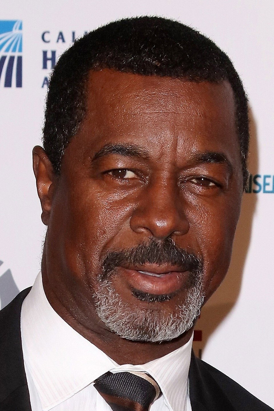 Dwight Hicks as Mortician in They Come Knocking