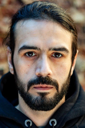 Bamshad Abedi-Amin as Security Guard in Beyond Existence