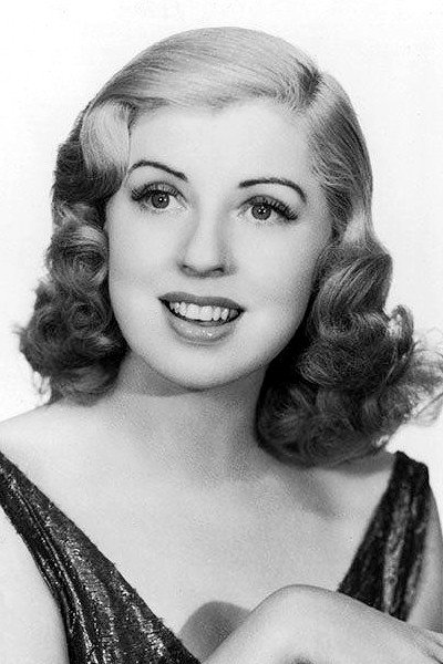 Dennie Moore as Mazie Gray in Meet Nero Wolfe