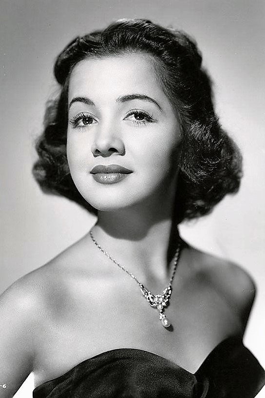 Olga San Juan as Nita Nova in Blue Skies