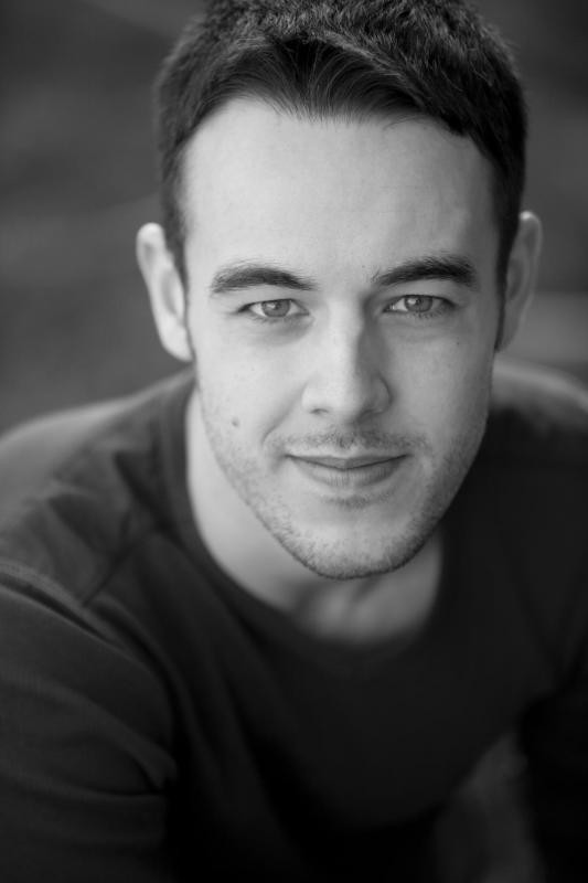 Simon Lloyd-Roberts as Merlin in Merlin and the War of the Dragons