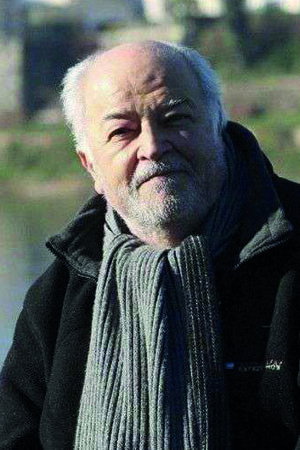 Claude Villers as Pierre in Target of Suspicion