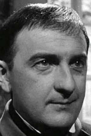 Jean Pignol as M. Rebuffel (maire,directeur d'école, chef résistance locale) in Les Lavandes et le Réséda