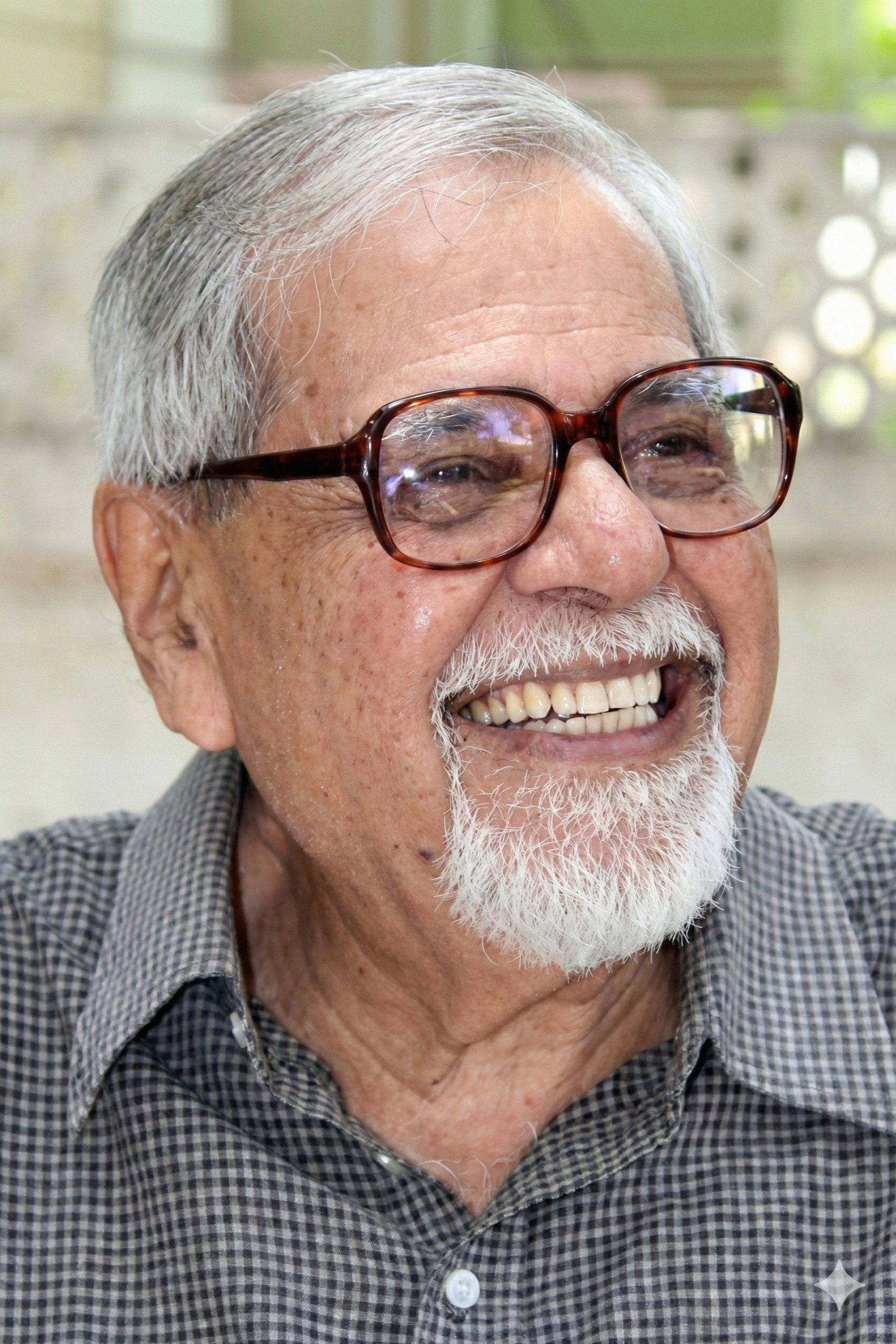 Shankar Melkote as Roopa's Boss in Anand