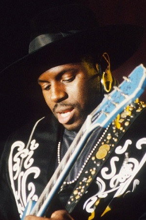 Levi Seacer Jr. as bassist  guitarist in Prince & The New Power Generation: Live at Glam Slam