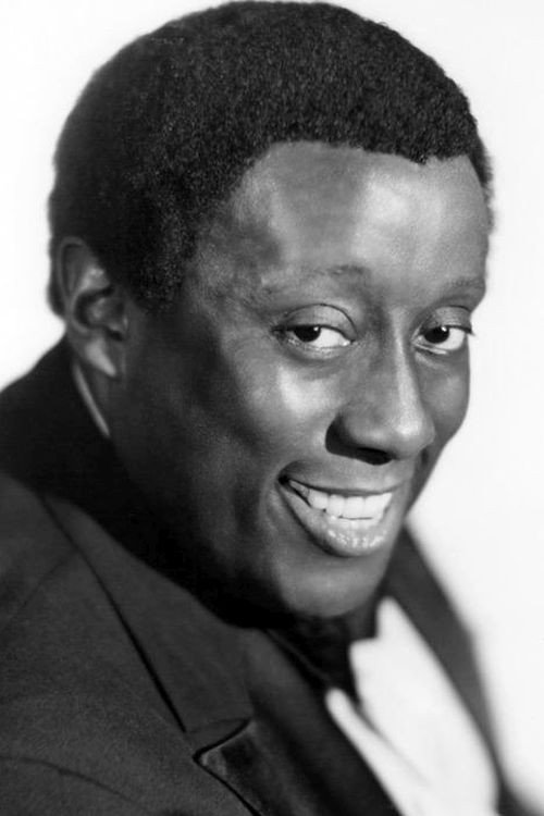 Godfrey Cambridge as Ford Malotte in Friday Foster
