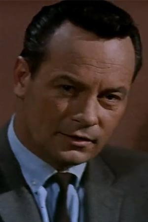Michael Keith as Eric Carter in King Kong vs. Godzilla